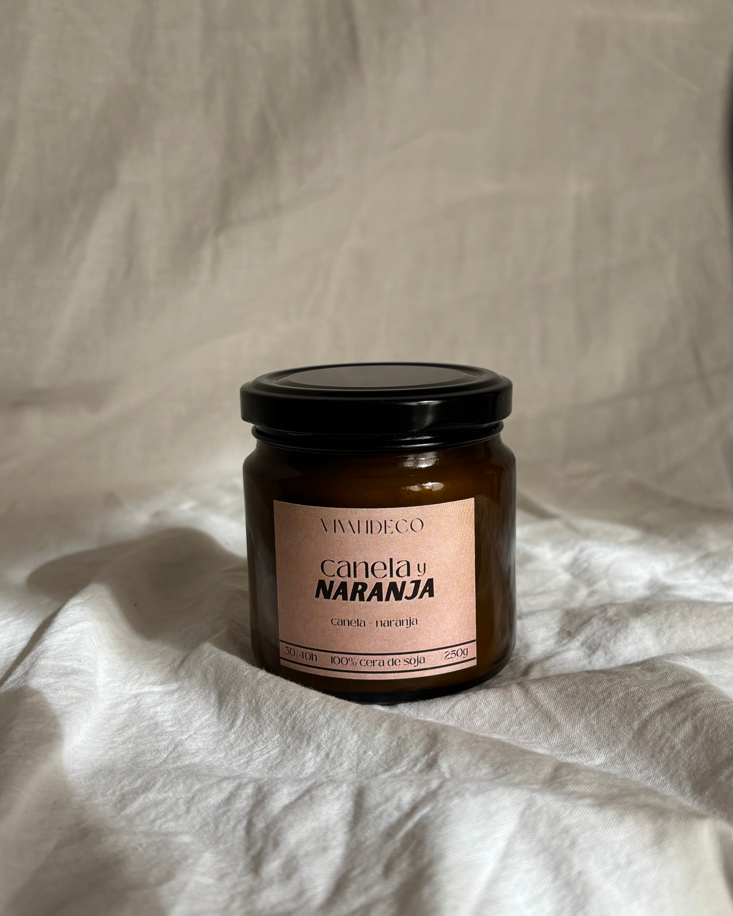 Vela Canela y naranja